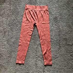 size medium SO burnt orange stretch leggings